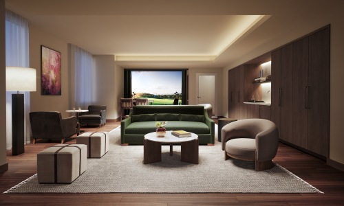 a lounge with a couch and a chair