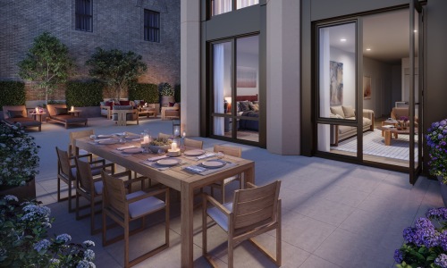 a patio area with tables and chairs