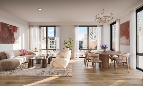 a living room with a couch, tables and chairs