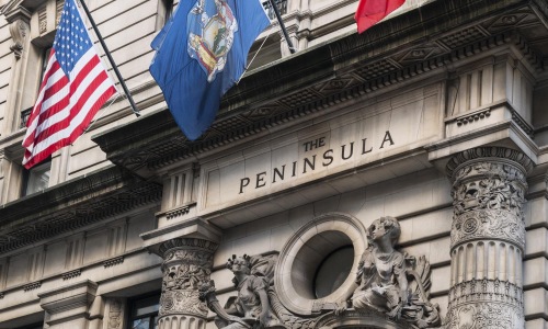 a building with flags on the front